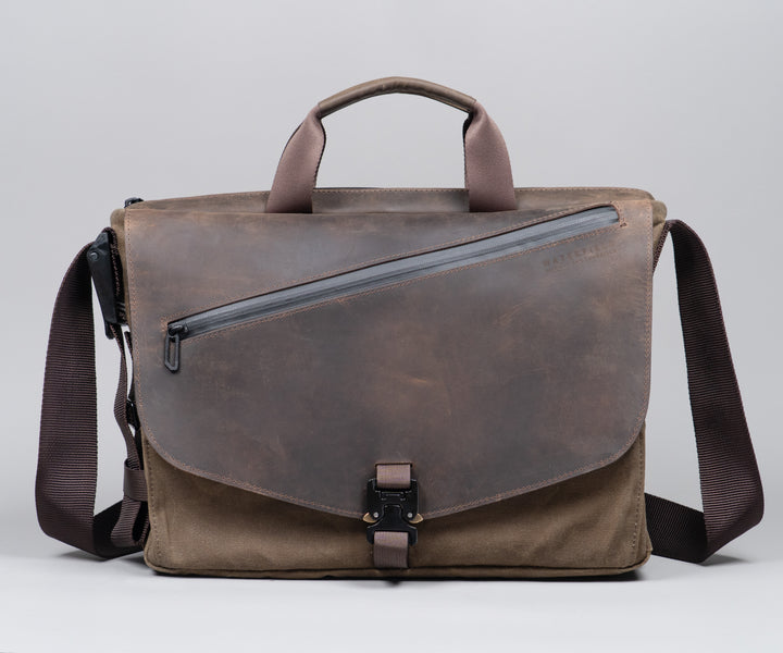 Distinctive dual-leather front flap with waterproof YKK zipper