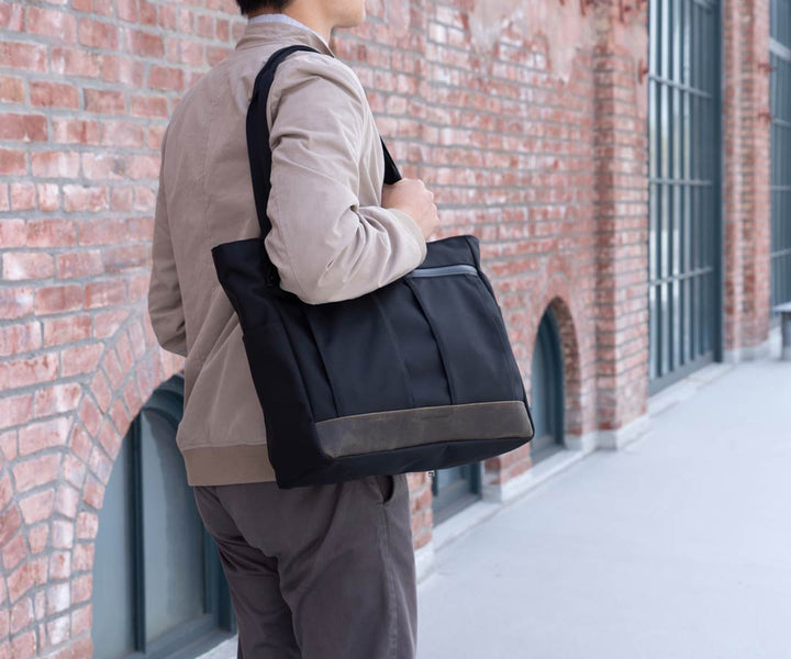 Longer handles for over shoulder carry