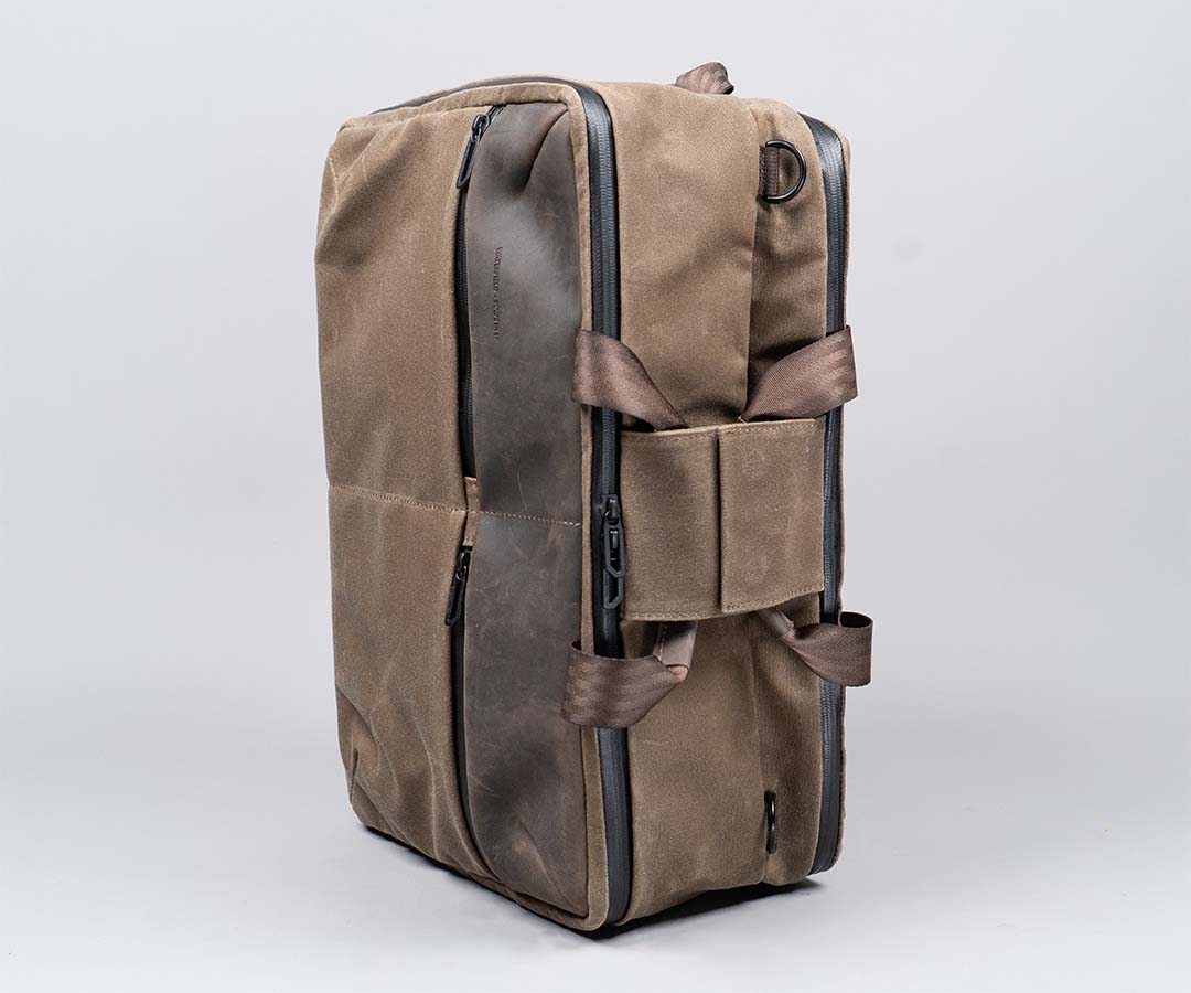 Tuck away the side handles for backpack mode