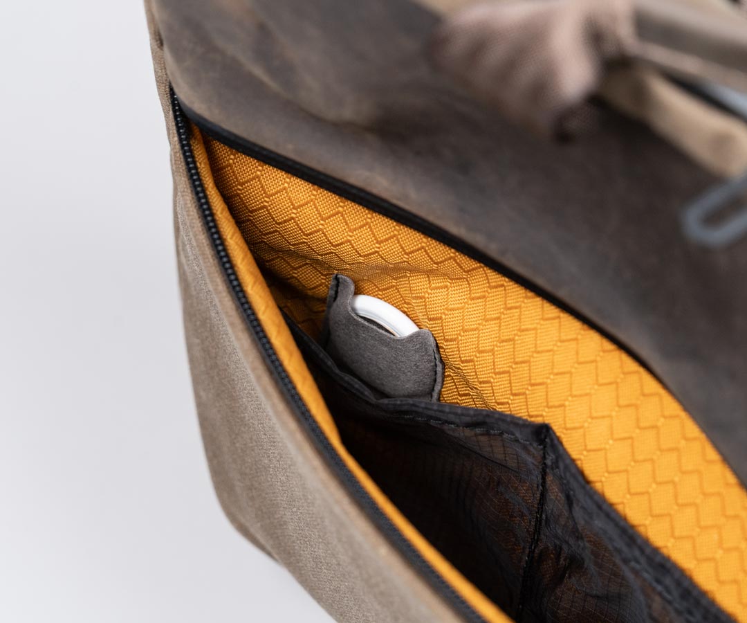 Hidden AirTag slot
