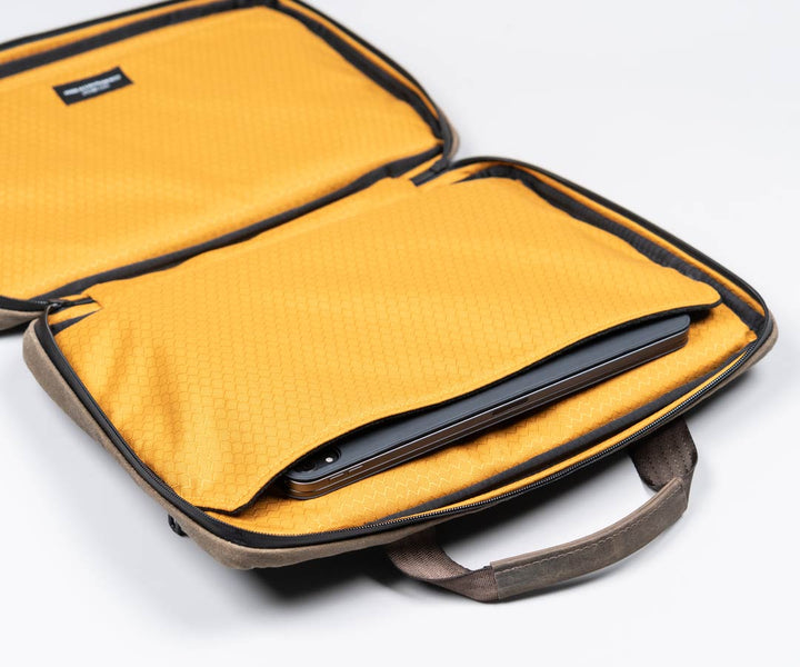 Two built-in padded device pockets