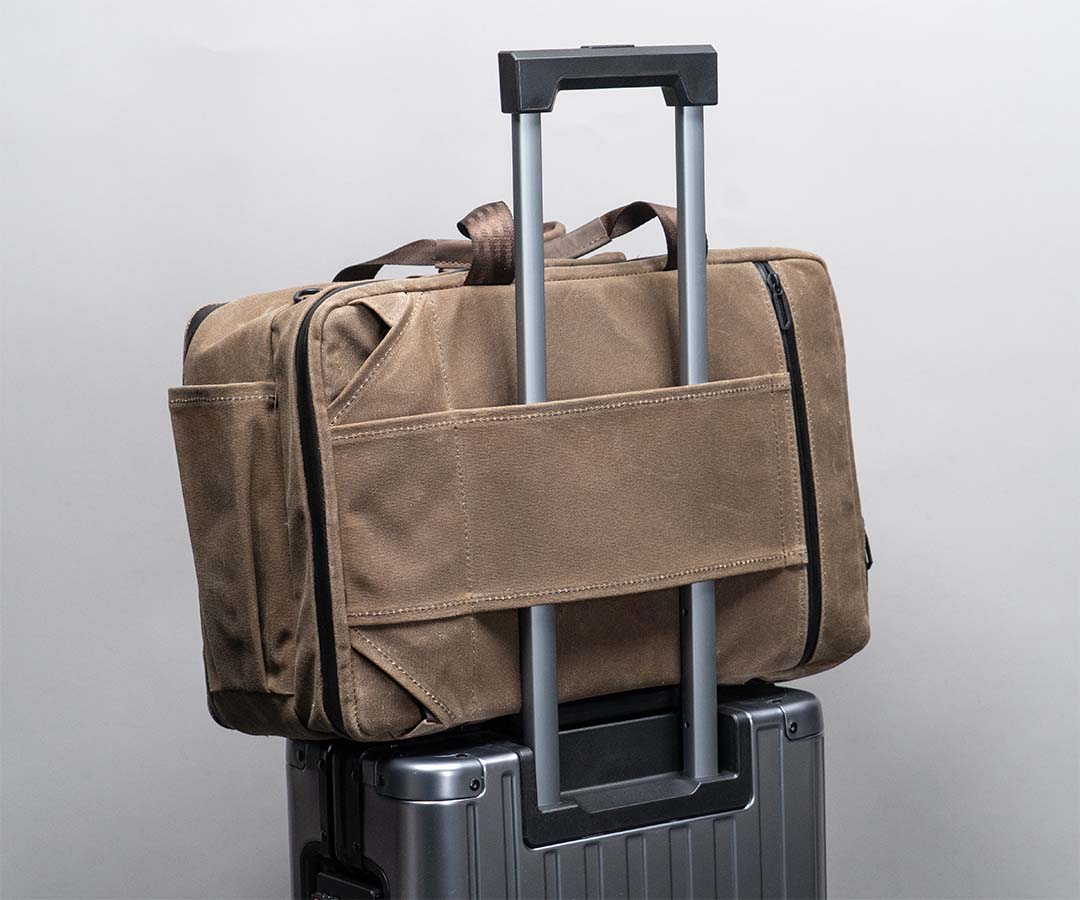 Suitcase handle passthrough