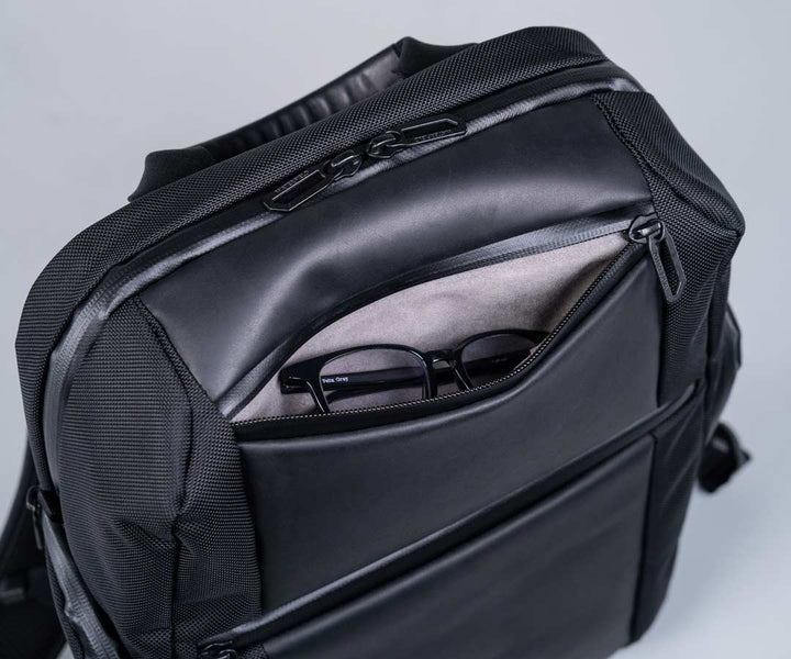 Top pocket is lined with Ultrasuede for protecting glasses