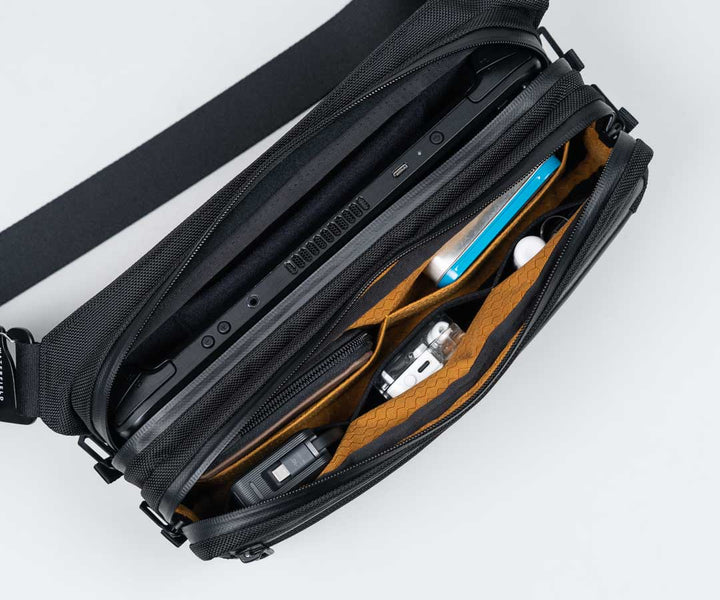 Back padded console pocket  + front organizational pocket