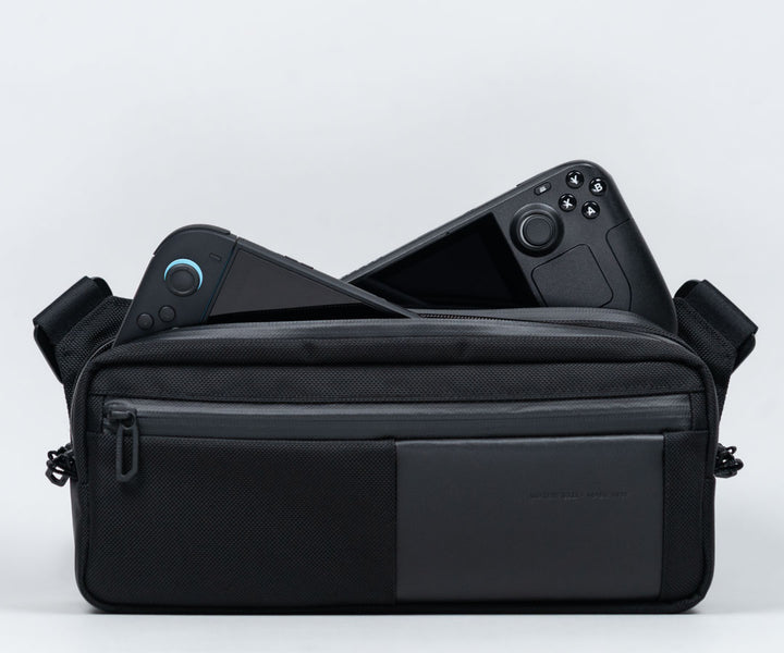 Designed to carry two gaming handhelds