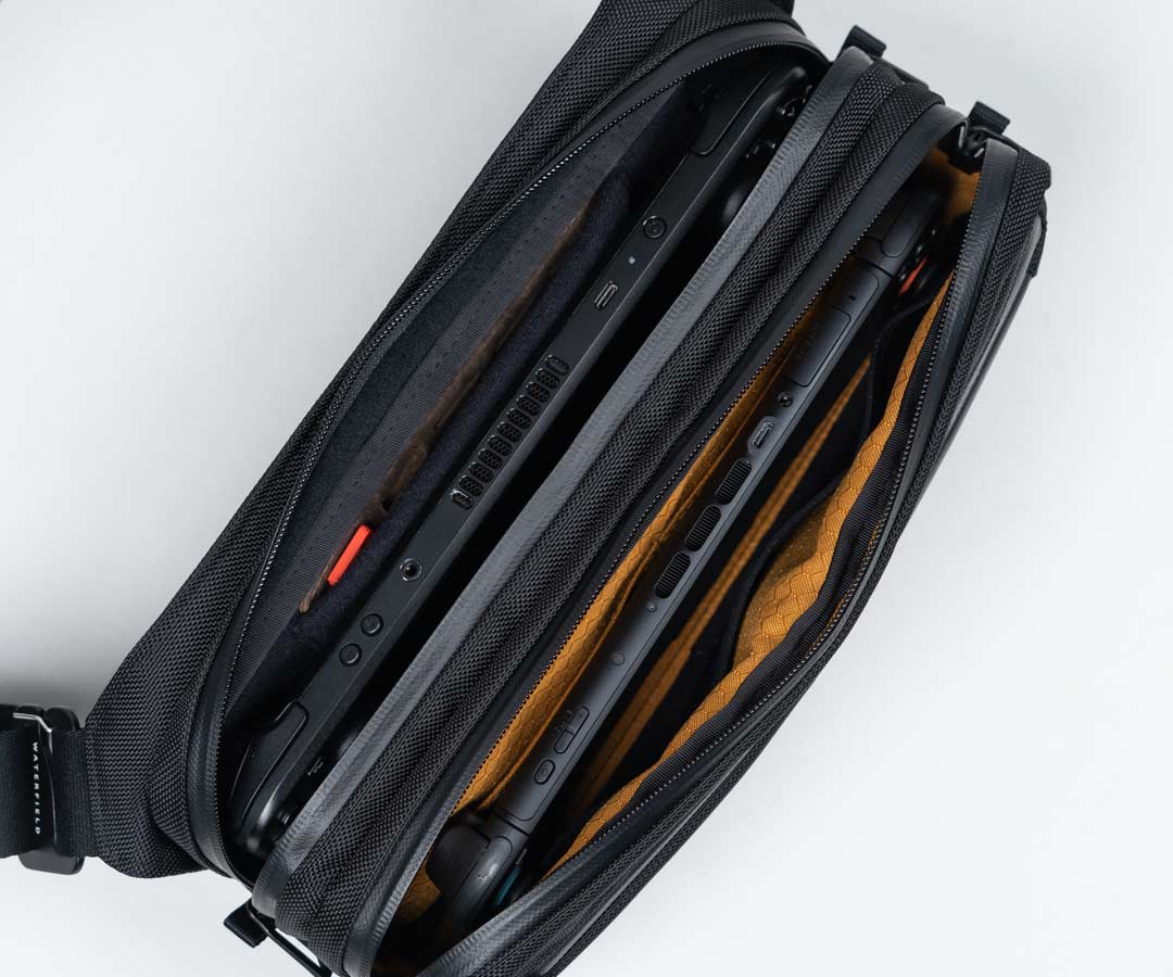 Front accessory pocket can be used to carry another handheld