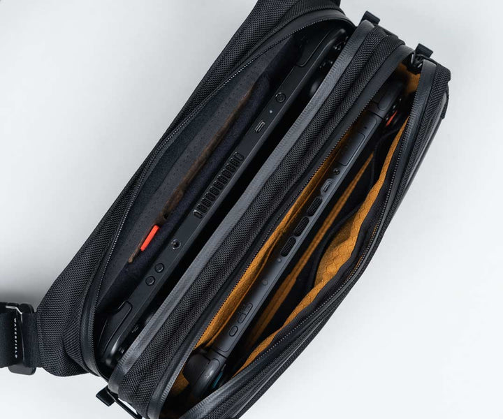 Front accessory pocket can be used to carry another handheld