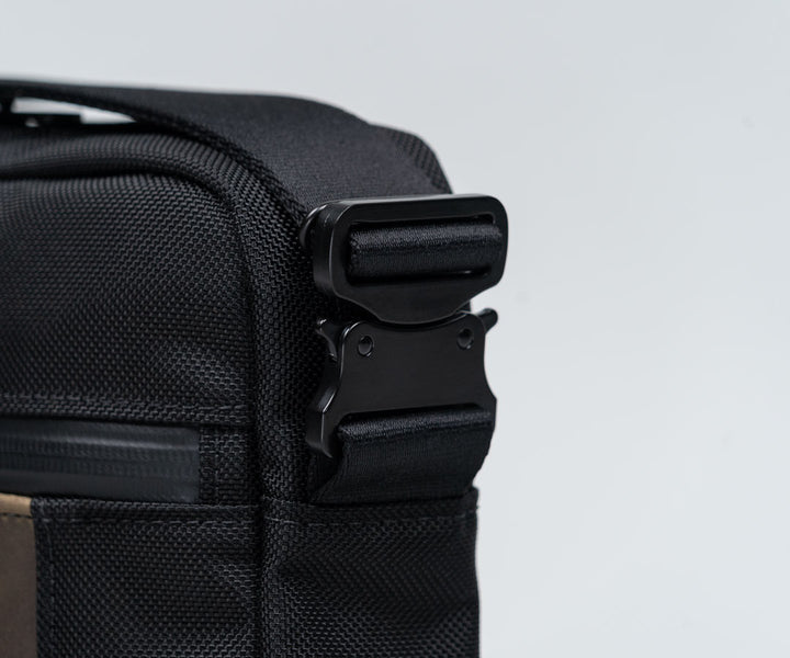 Strap is anchored by a paragliding-style buckle 