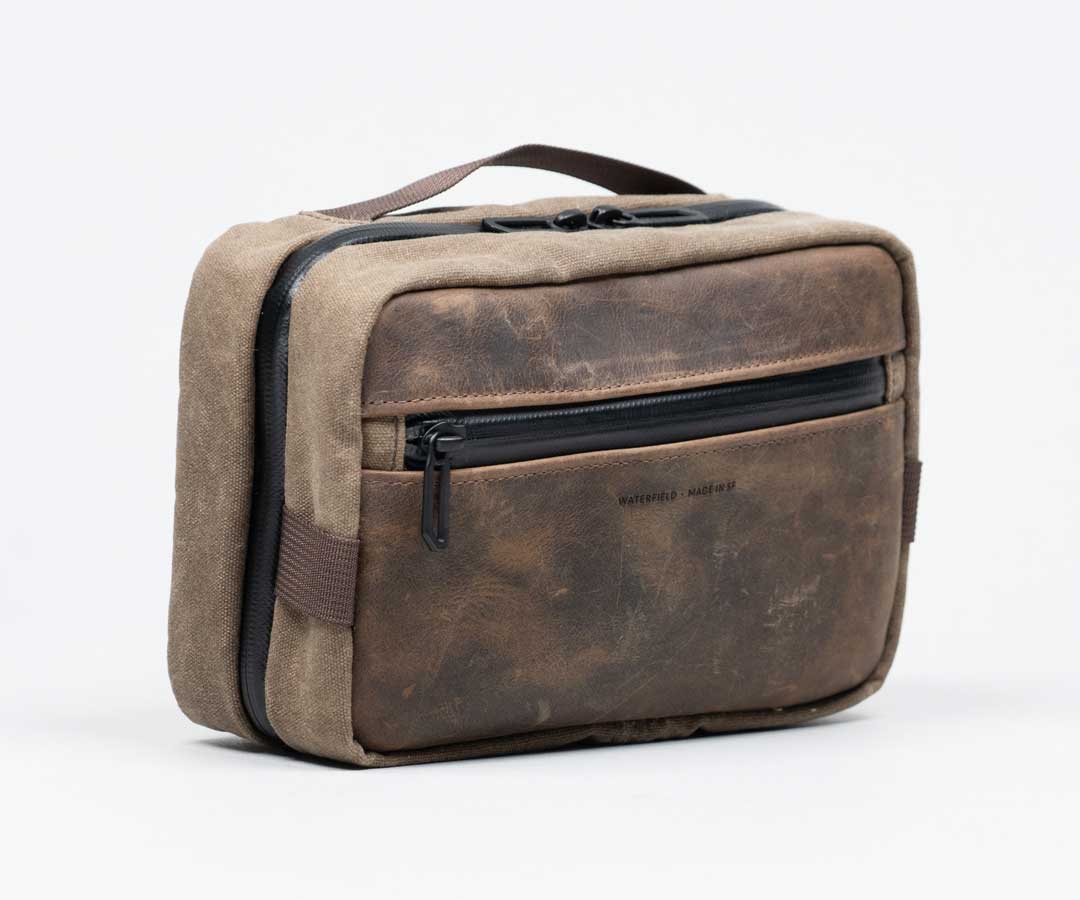 Stylish full-grain leather with waxed canvas