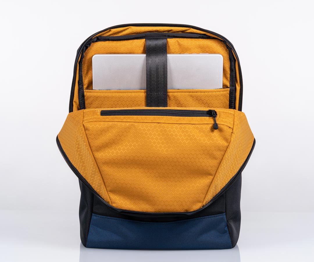 Padded pocket for laptops up to 16 inches. Zippered interior pocket.
